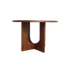 Table ronde en bois massif brun, pied sculptural croisé, Ø120 cm