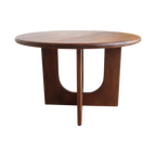 Table ronde en bois massif brun avec pieds sculpturaux croisés, Ø120 cm