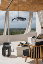 Tabouret en bois de suar noir forme U et assise tressée