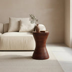 Table d’appoint en manguier brun forme sablier H45 cm