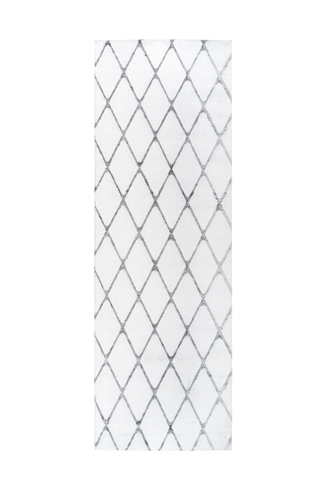 Tapis à motifs losanges blanc et gris en polyester doux dans un salon moderne
