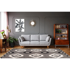 Canapé en tissu gris clair avec pieds en bois pour Tapis Ethnique Noir et Blanc 120x170 cm