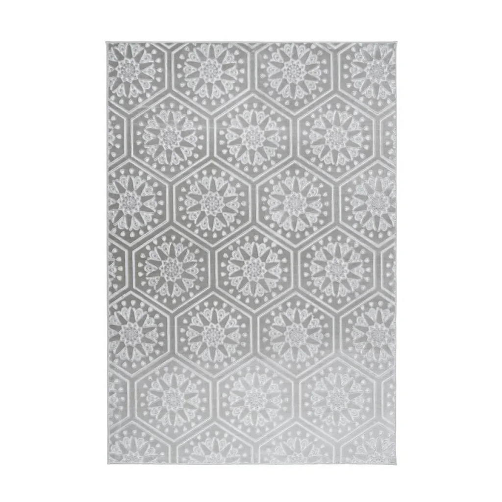 Tapis rectangulaire gris et blanc avec motifs hexagonaux et étoiles en velours