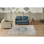 Tapis oriental beige et bleu avec motif central rectangulaire et look distressed