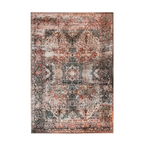 Tapis oriental vieilli avec motif floral et medaillon en noir, rose et crème