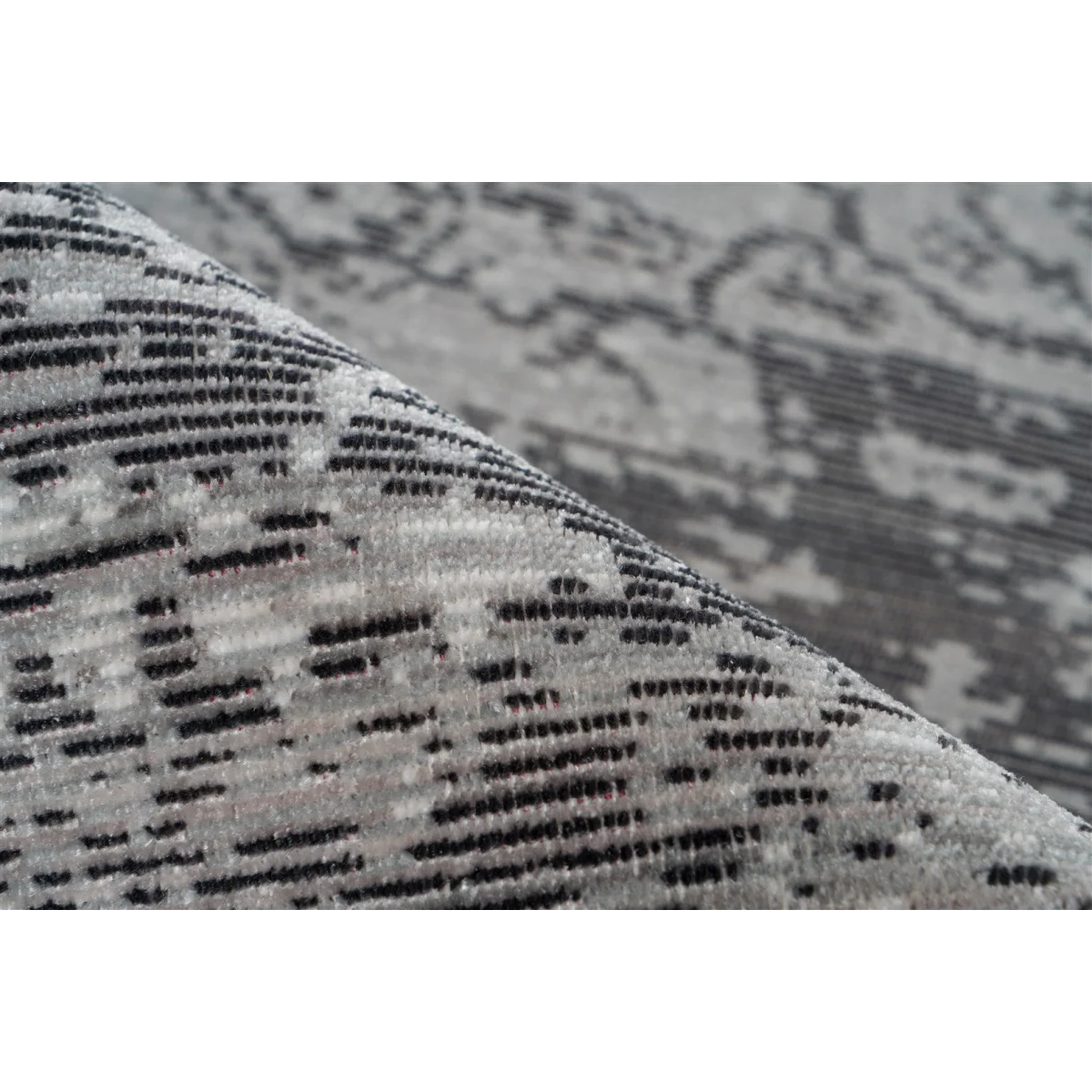 Tapis oriental rectangulaire gris effet vieilli doux roulé avec motif gris et noir