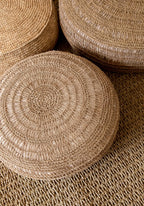 Coussin rond en raphia naturel pour un style bohème écologique et confortable
