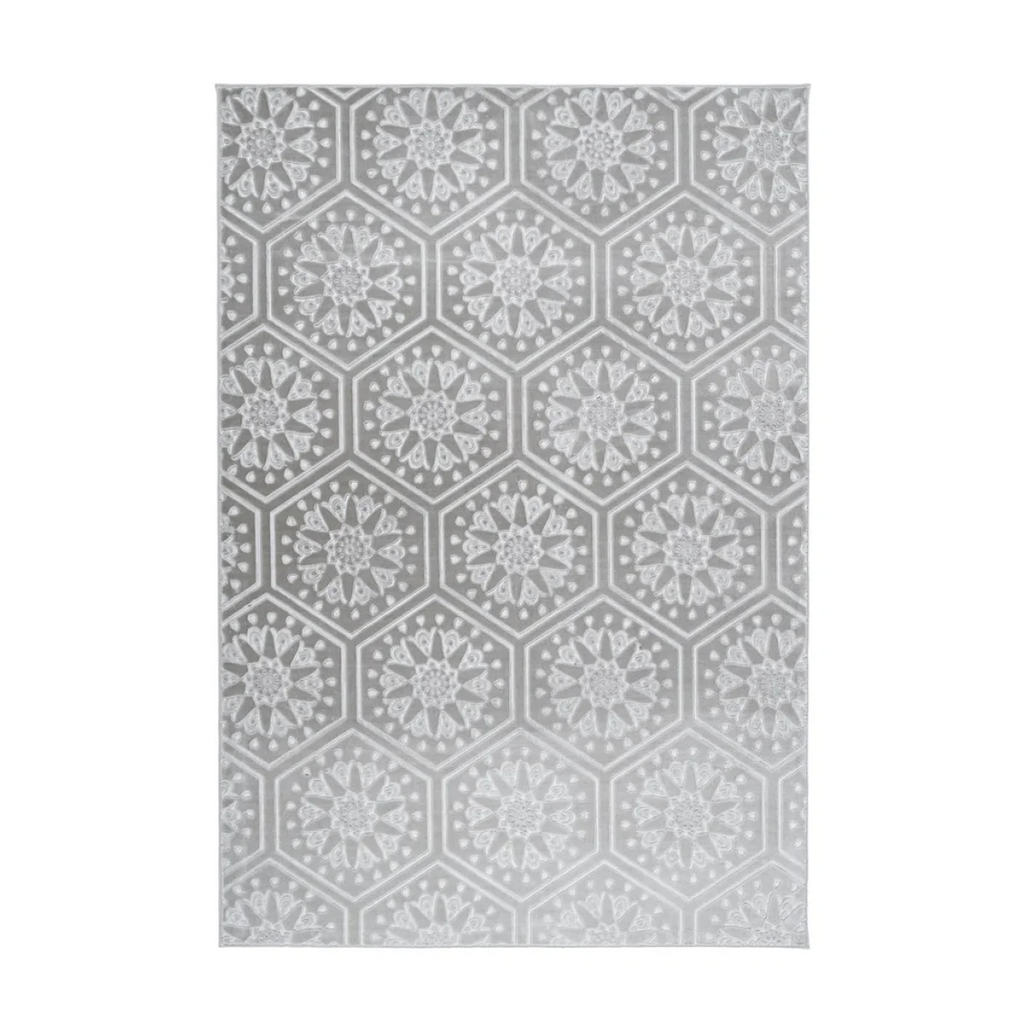 Tapis rectangulaire gris et blanc avec motifs hexagonaux et étoiles en velours