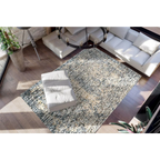 Tapis rectangulaire chiné crème et bleu en viscose avec motif texturé noir et blanc