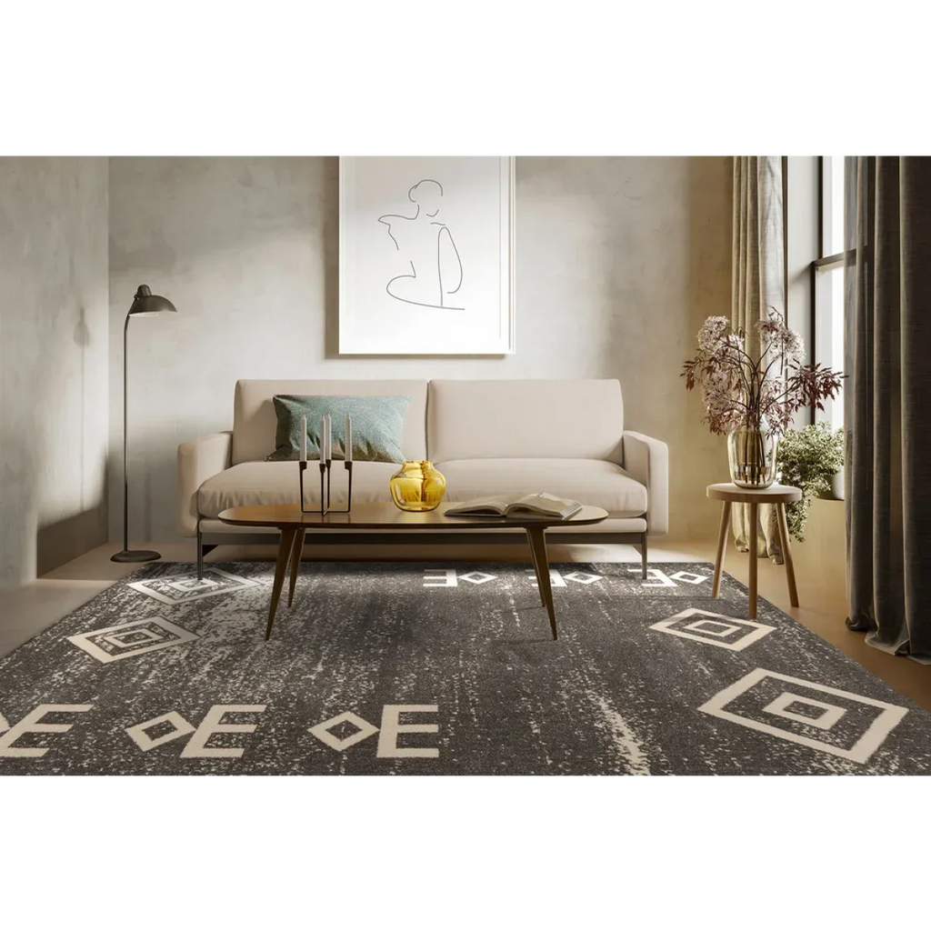 Tapis rectangulaire gris motifs ethniques 80x150 cm dans un intérieur élégant