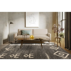 Tapis rectangulaire gris motifs ethniques 80x150 cm dans un intérieur élégant
