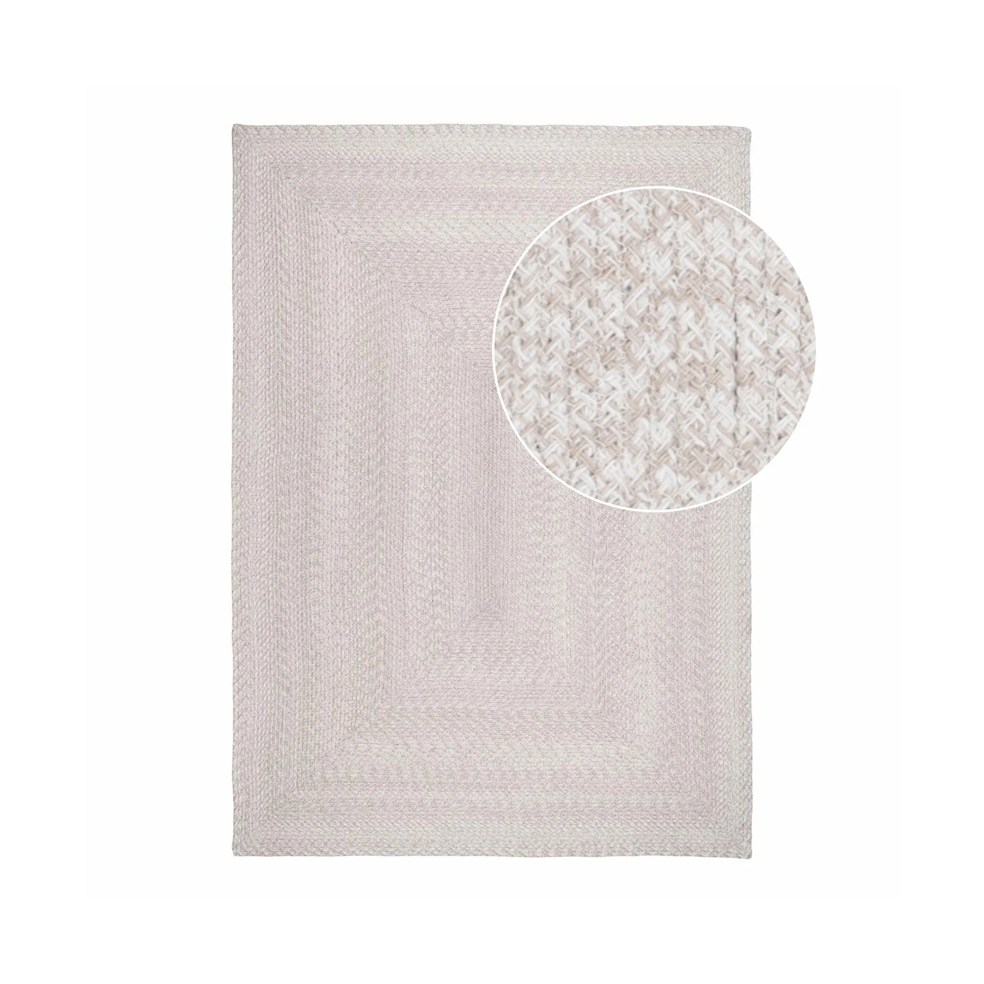 Tapis rectangulaire en matière recyclée avec motif chevron sable et détail circulaire