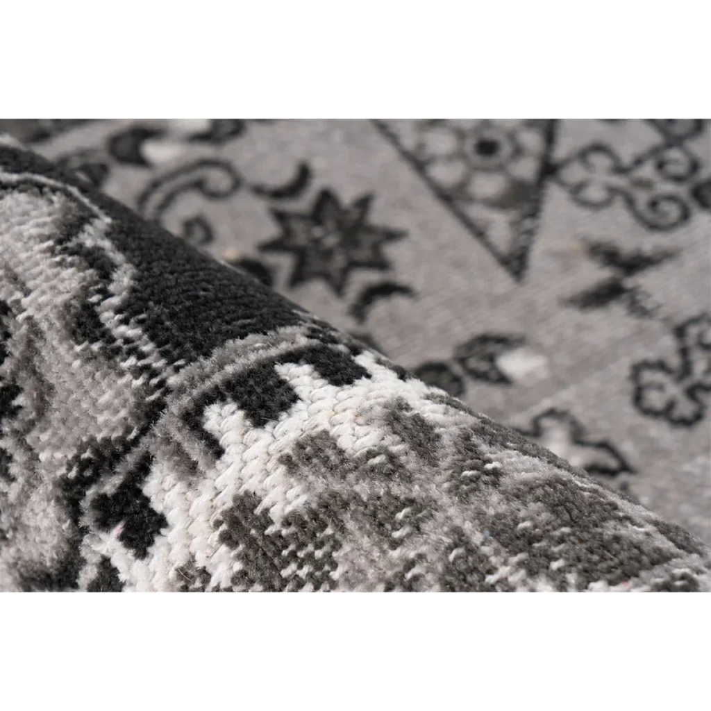 Tapis gris et noir roulé avec motif pour le produit Ariya 400 Grau 120cm x 170cm