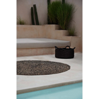 Tapis rond en jonc de mer noir 150 cm avec texture tissée sombre et chaleureuse