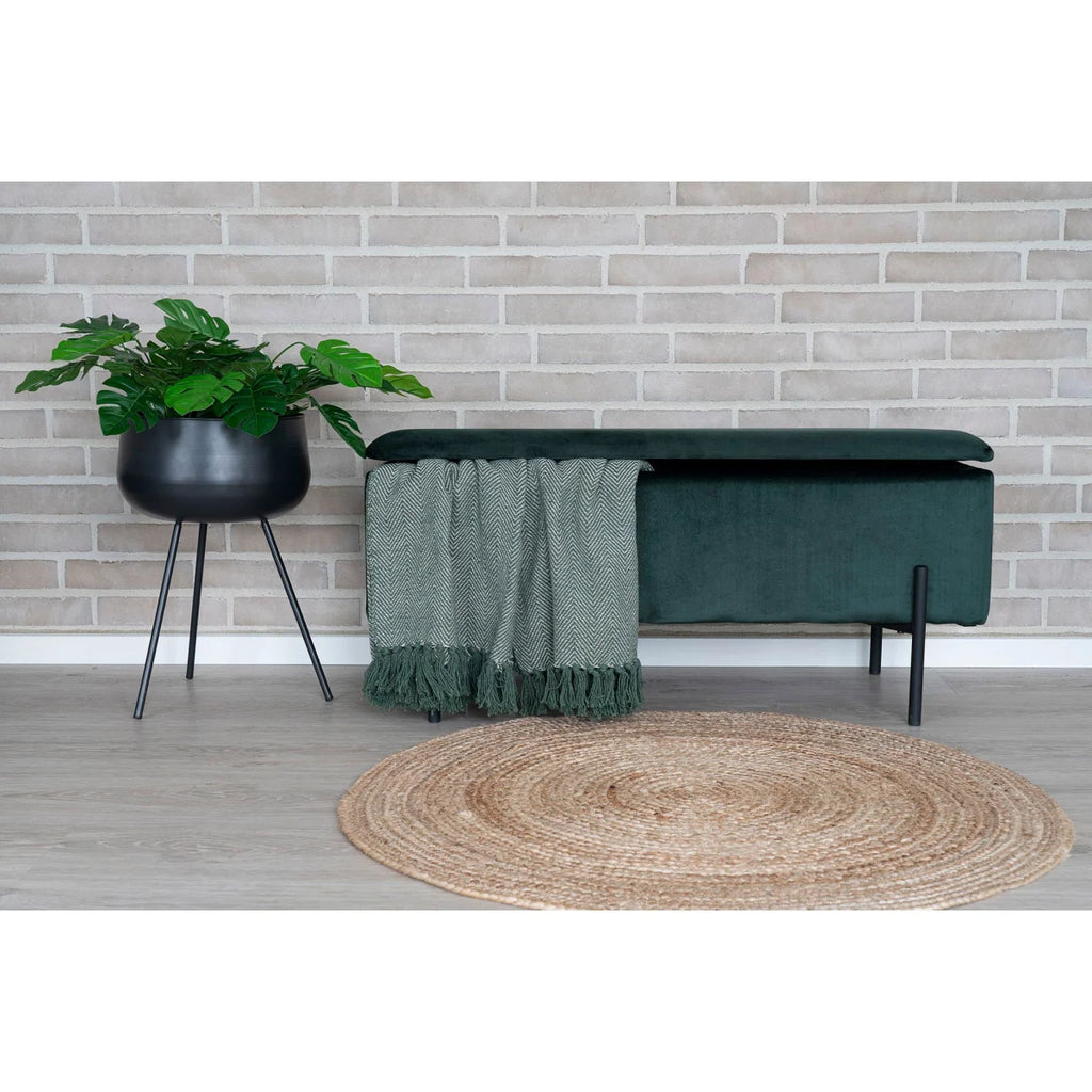 Banc de rangement en velours vert foncé, pieds métal noir, couverture assortie