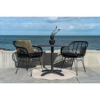Table rattan noir tressé, base métal, chaises assorties, océan
