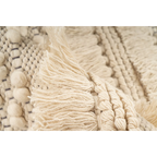 Tapis rond en laine écrue avec franges et relief tressé, textile crème texturé