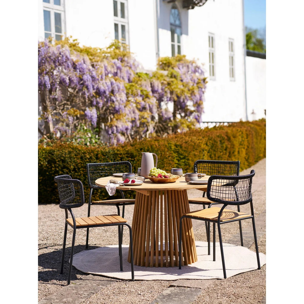 Ensemble extérieur moderne : table ronde bois recyclé sable Ø180 cm, 4 chaises fil noir tressées
