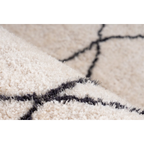 Tapis shaggy écru à motifs losanges noirs en polyester, doux et moelleux