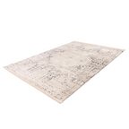 Tapis tufté vintage écru et anthracite avec motif géométrique abstrait et usé