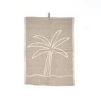 Torchon en lin naturel beige motif palmier blanc cassé