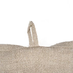 Coussin en lin beige naturel motif poisson écru à texture tissée et anse boucle