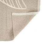 Tapis en lin naturel beige motif feuille blanc subtil