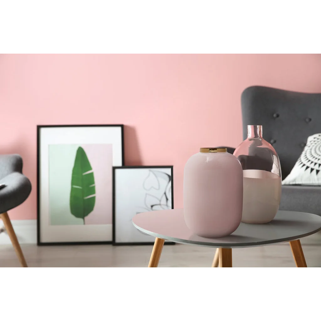 Deux vases décoratifs Art Deco 330 Hellrosa Gold sur une table basse