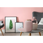 Deux vases décoratifs Art Deco 330 Hellrosa Gold sur une table basse