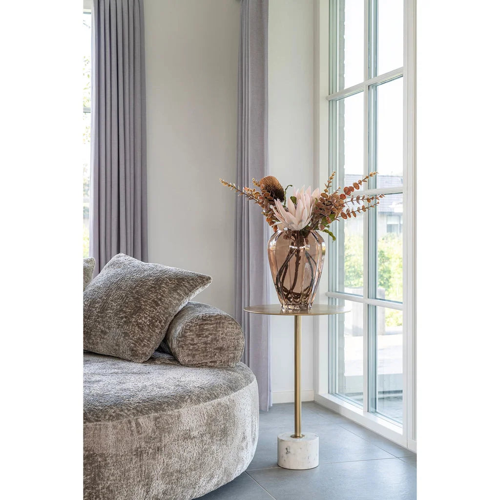 Canapé rond en velours avec coussin décoratif, idéal pour le Vase en verre marron